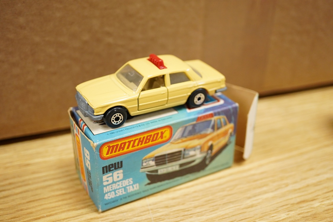 Twelve boxed Matchbox Superfast and Rola-matics 1-75 vehicles; rescue hovercraft (2), Porsche turbo (3), Mercedes tourer (6), Rover 3500 (8), car transporter (11), the Londoner bus (17), Silver Jubilee bus, cement truck